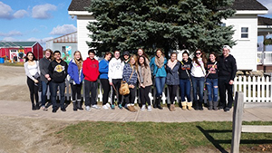 A small number of Hispanic Honor Society’s members enjoying their trip to the cider mill last fall. 