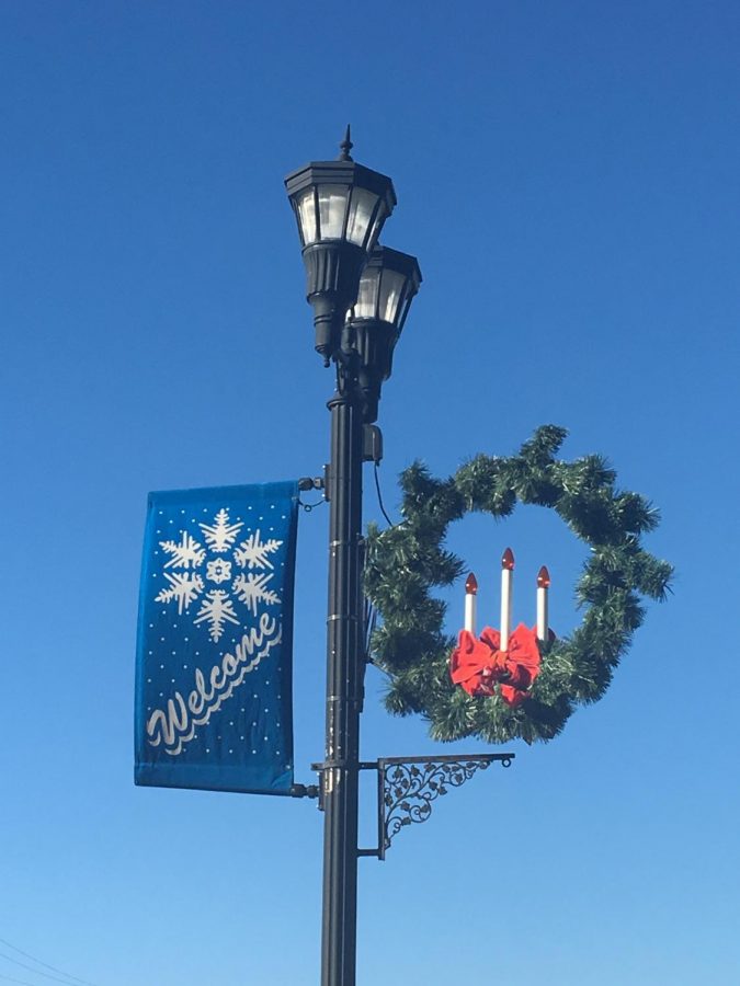 Holiday banners and wreaths decorate downtown Utica.