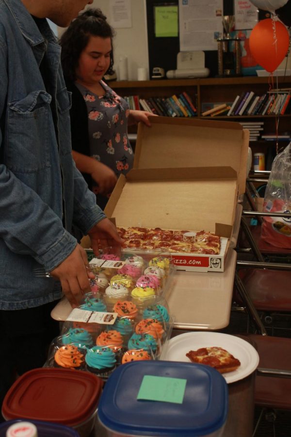 Attendees brought in pizza, cupcakes and cookies to the potluck.