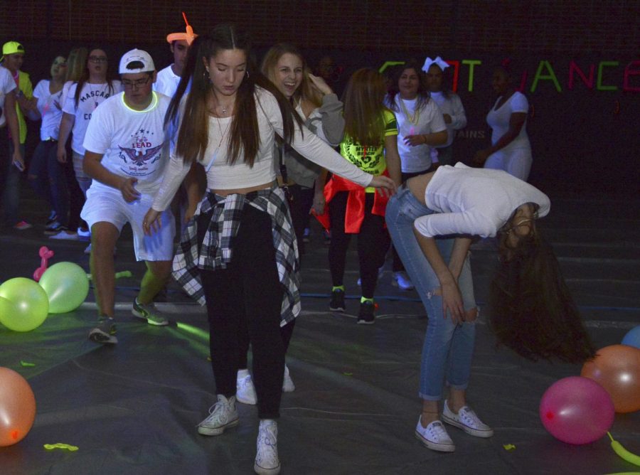 Gym lights up after exams at ‘glow-out’ dance