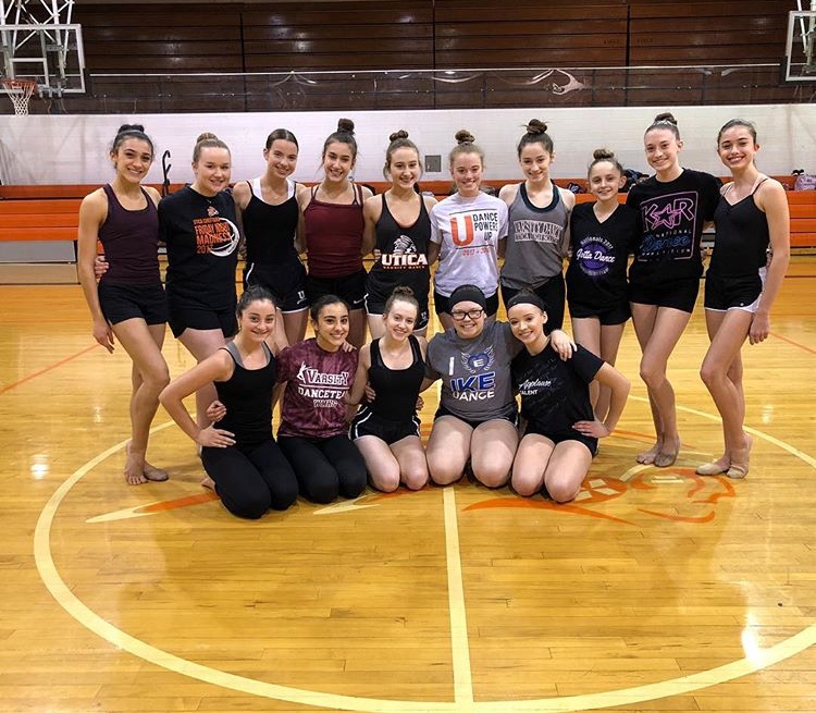 The 2018-2019 poses after finishing their first practice.