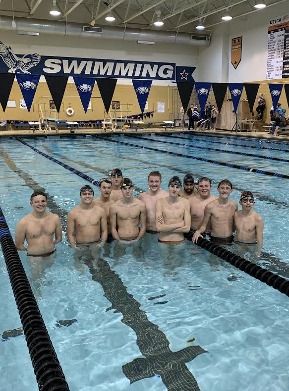 Boys Swim Team poses for a picture 