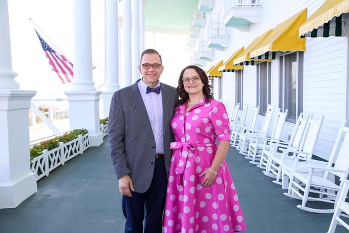 Principal Tom Lietz poses with his wife, Elizabeth Lietz, on the porch of the Grand Hotel.
