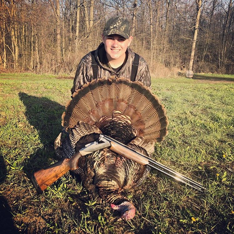 Junior Dillon Wagner poses with his hunt at his cottage.