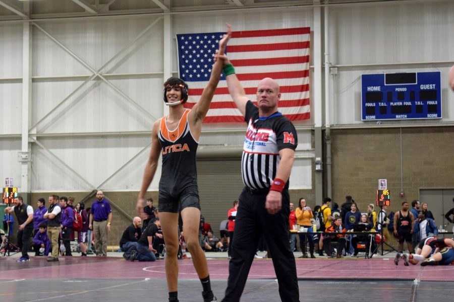 Prior to winning his first match of the county tournament, the referee raises junior Hunter Ali’s hand toward the crowd. “I was really excited because it was a big tournament,” Ali said. “Winning the first match meant I could continue to the next day.” Ali’s victory allowed him to compete in the next day of wrestling, helping his team earn fifteenth place out of 36 teams. 