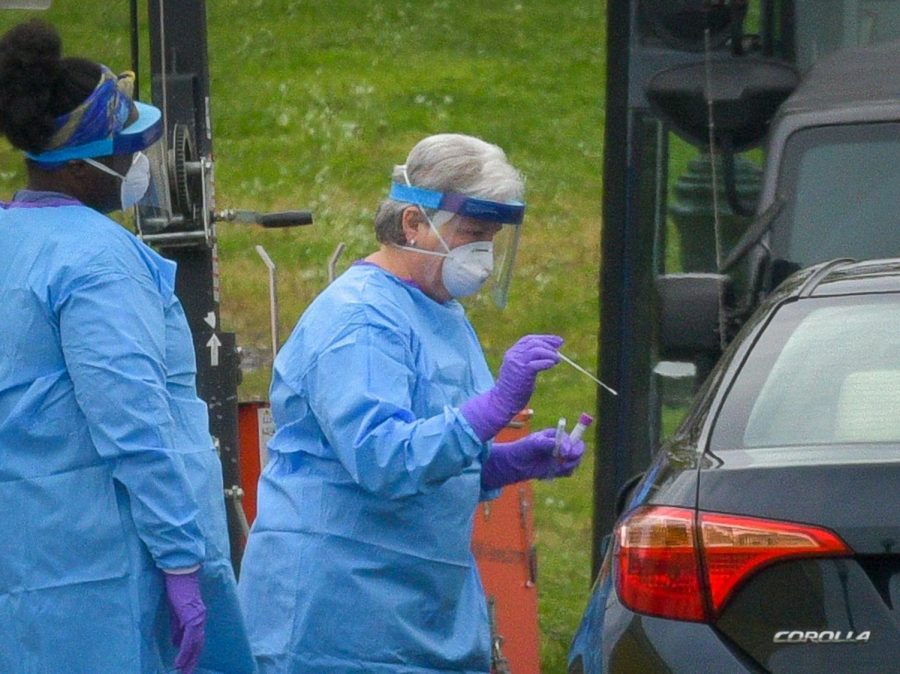 This is a drive-up testing site for possible COVID-19 patients. Not everyone can be tested for COVID-19, but in order to get tested, one has to contact a local healthcare provider. These healthcare workers are wearing CAPRs, N95 masks, gloves, and gowns to protect themselves.  