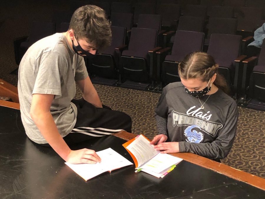 Douglas Gettleson & Julie Syler going over lines for the upcoming play, ‘Crafting a Killer” 
