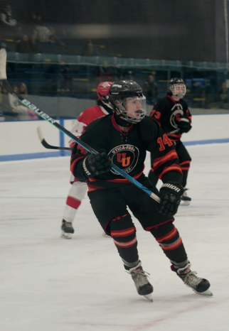 Senior Carson Konczalski skates against Anchor Bay.