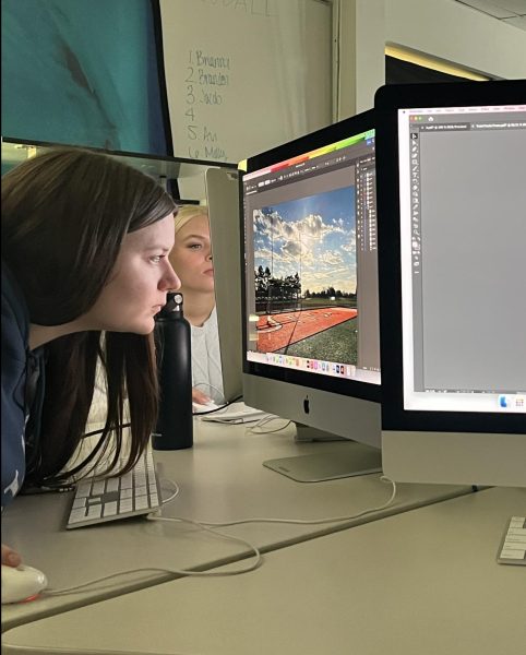 Senior Avery Green in Multimedia class working on her seven grandfathers project.