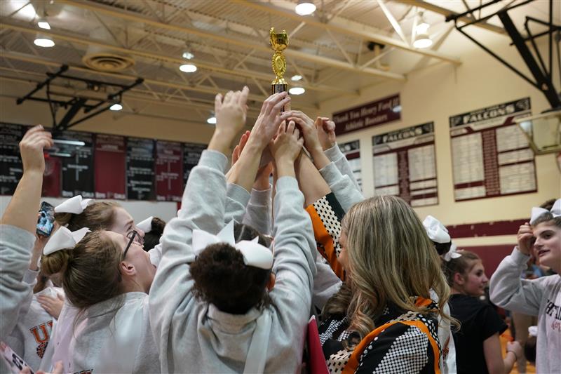 Varsity celebrates their win, taking home the trophy for the second year in a row.