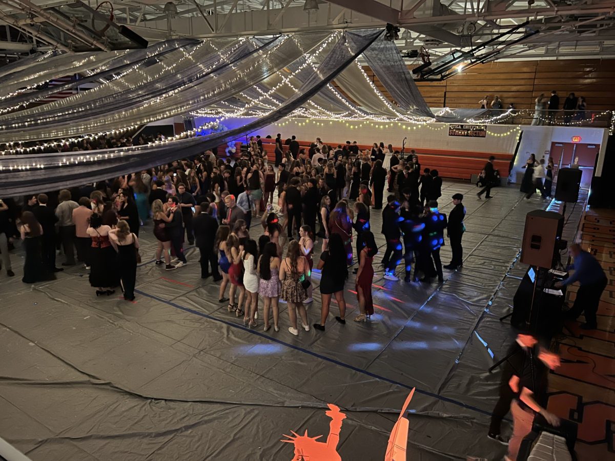 Students on the dance floor at homecoming.