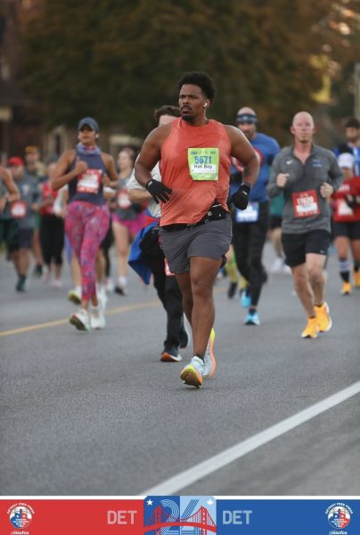 Teacher Clayton Sumner running the 2024 Detroit Free Press Marathon