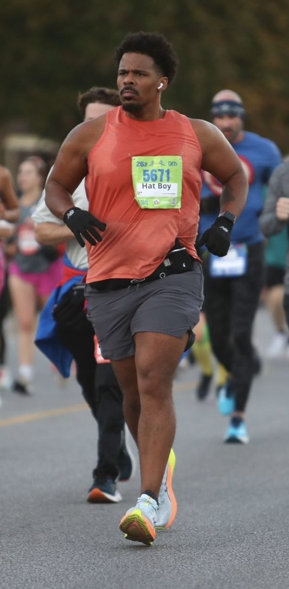 Teacher Clayton Sumner running the 2024 Detroit Free Press Marathon