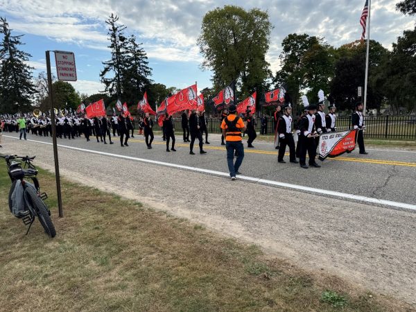 The Marching Band followed by other clubs’ parades down Shelby Road as they approach Utica High School for the Homecoming Game on Friday October 4th.