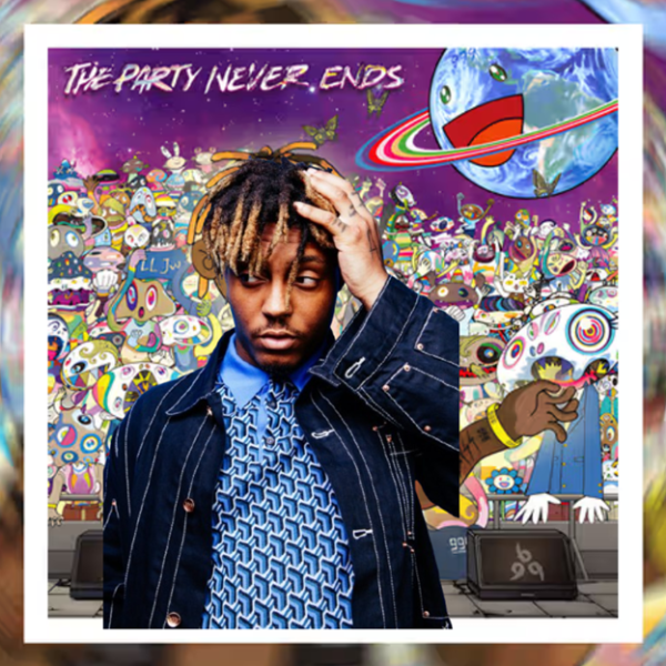 Juice Wrld in front of his album cover for The Party Never Ends.