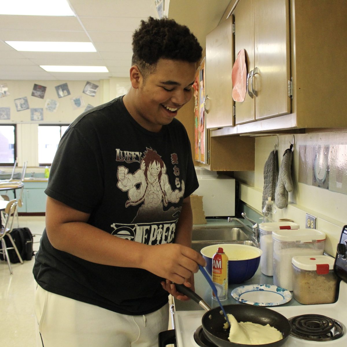 Photo of the Day #21!
Sophomore George Madison baking Kaiserschmarn;
Austrian pancakes, at German Club.