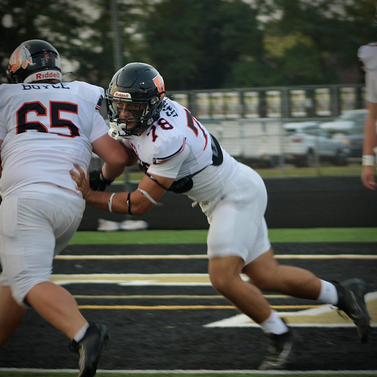 Photo of the Day #26!
Senior Dominick Gandy practices tackles before the game against L'Anse Creuse North.