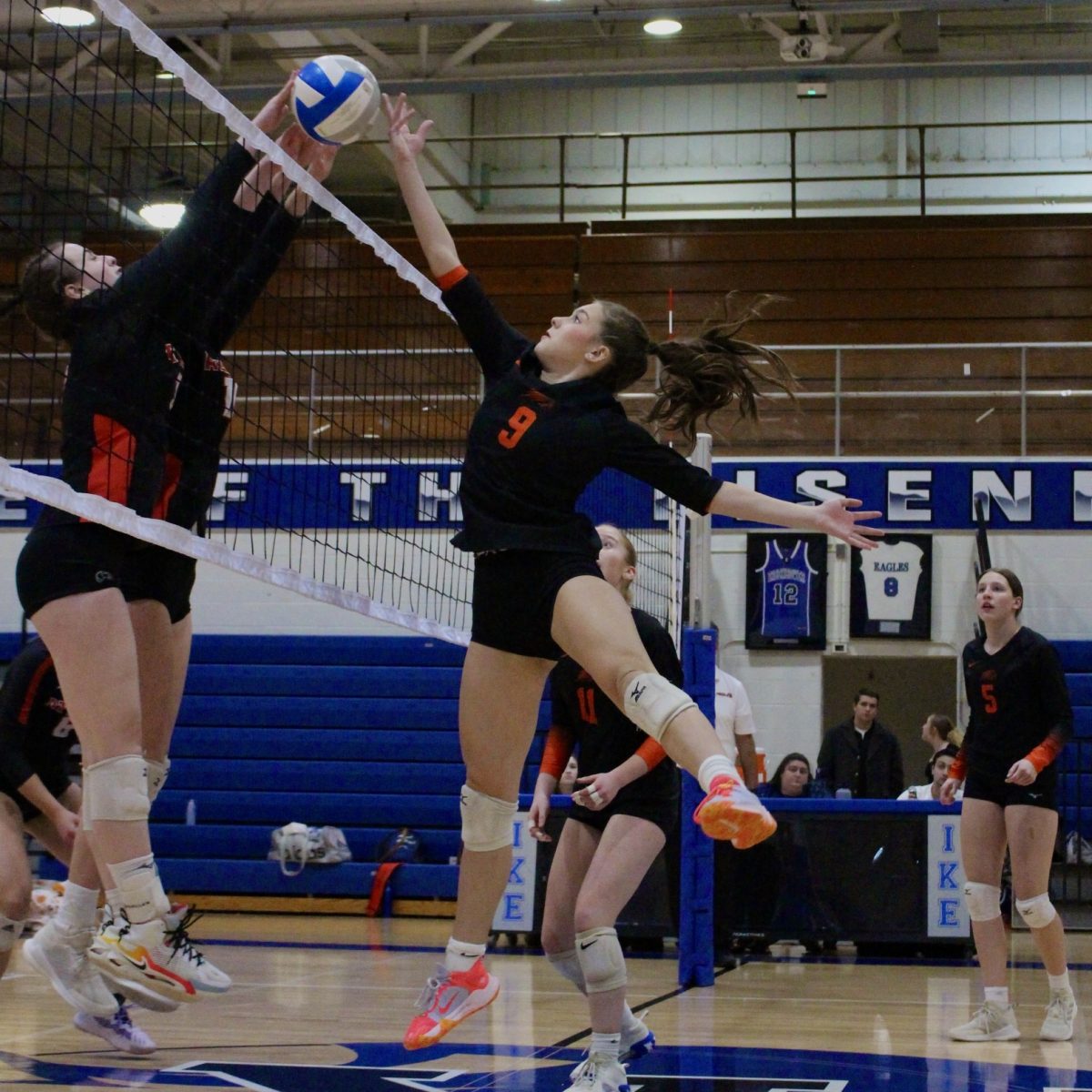 Photo of the Day #41!
Sophomore Kylee Backus leaps into the air as she fights to hit the ball over the net and her opponents.