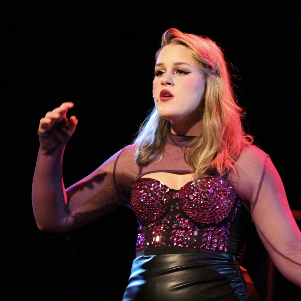 Photo of the Day #46!
During second through third hour, the Rock of Ages cast and crew was able to perform a few scenes from the musical to their first audience. One of the scenes involving character Justice Charlier; played by senior Kailey Fick, lending a helping hand to her friend Sherrie Christian by singing the song "Every Rose Has Its Thorn."