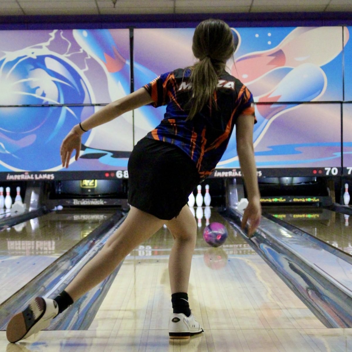 Photo of the Day #71!
Sophomore Ava Mazza watches the bowling ball roll down the lane before she achieves a strike at Imperial Lanes against Dakota.