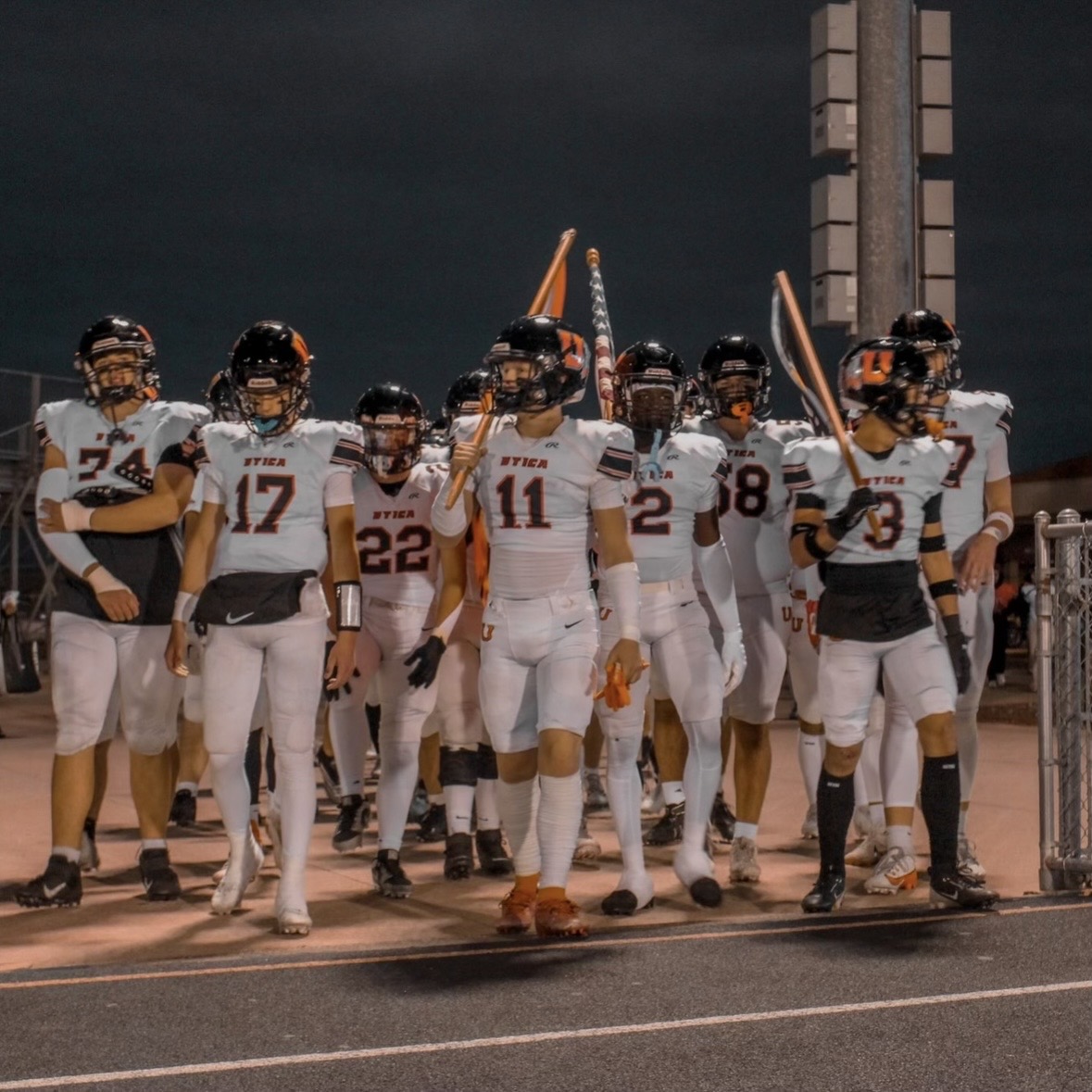 Photo of the Day #42!
Senior Caston Rissman leads the varsity football team out onto the field for the last time of the season at the playoff game against Dakota.