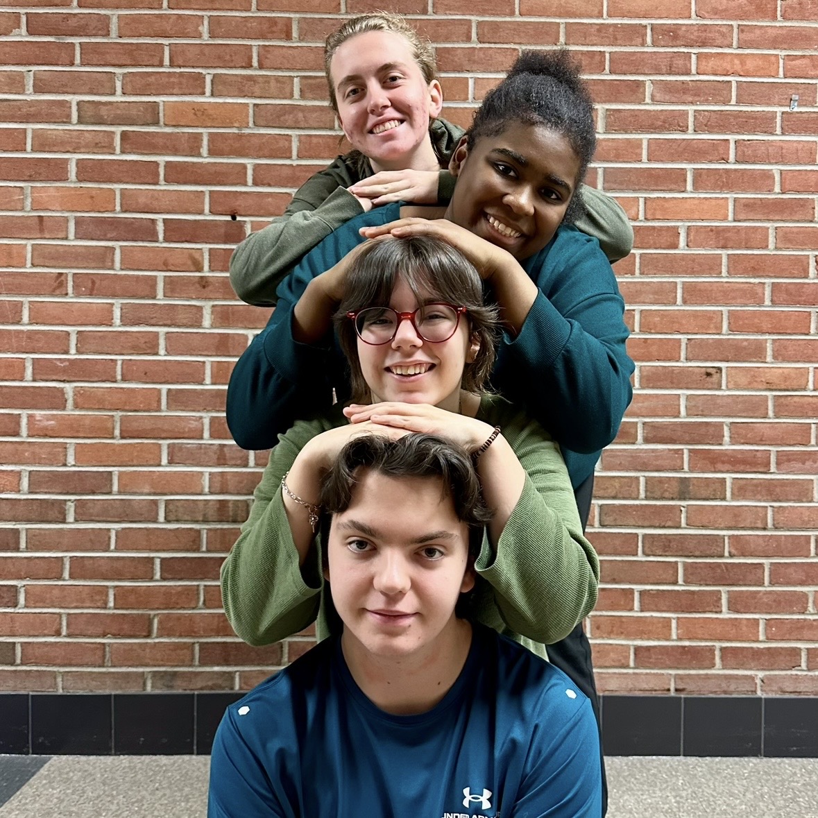 Photo of the Day #66!
Seniors Alessandra Ivanaj, TeYanna Eades, Theodore Thomson, and Tyler May show off their green attire for the spirit days class color day through the fun trend of the JCP Penny style sibling photo shoot.