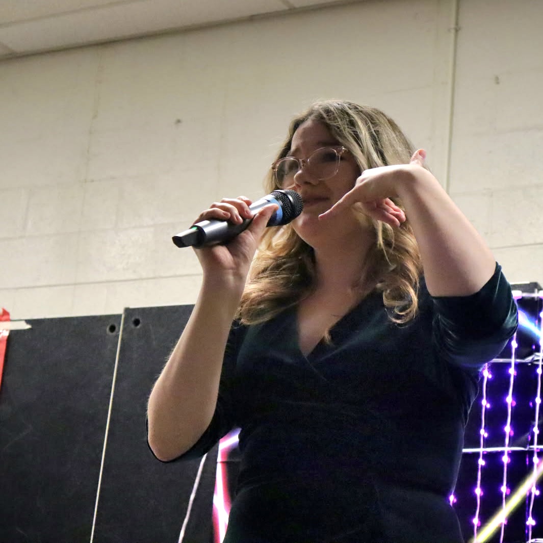 Photo of the Day #113!
Yesterday, senior Nicole Barents performed a solo at yesterday's Coffee House Fundraiser to keep the choir program up and running.
