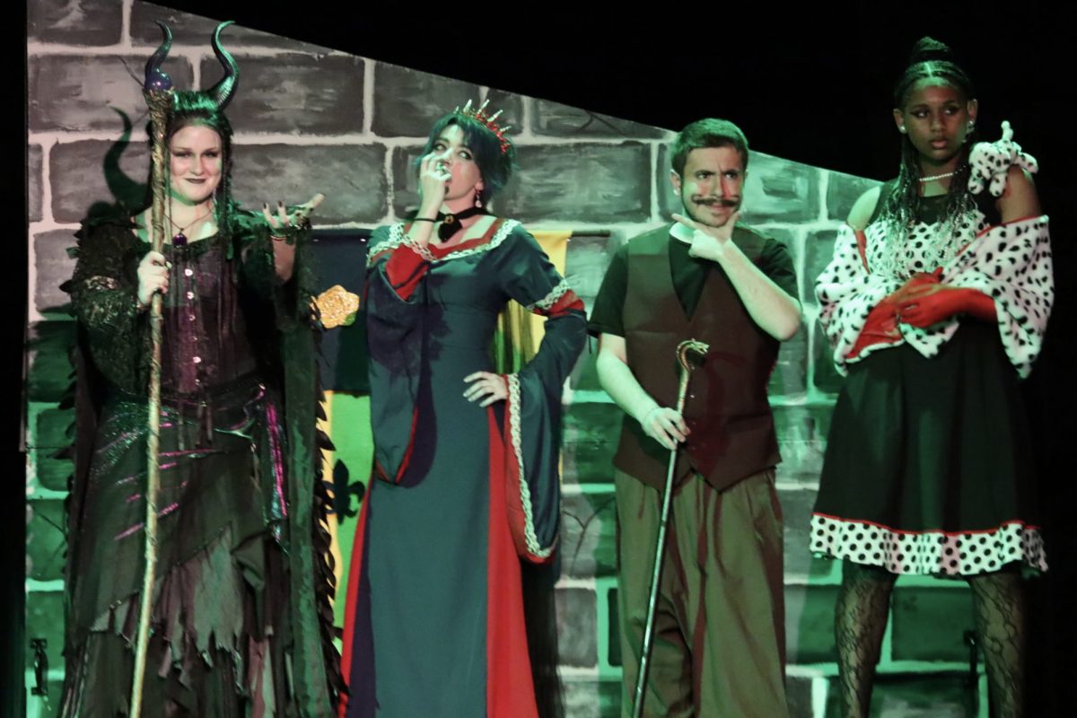 Photo of the Day #132!
Last night was the opening night for the Descendants Production. The musical follows the troublemaking children of Disney's classic villains: Cruella De Vil, Maleficent, the Evil Queen and Jafar. The parents are played by junior Jade McKinney, senior Kailey Fick, senior Kelsey Syler, and junior Johani Blushi.