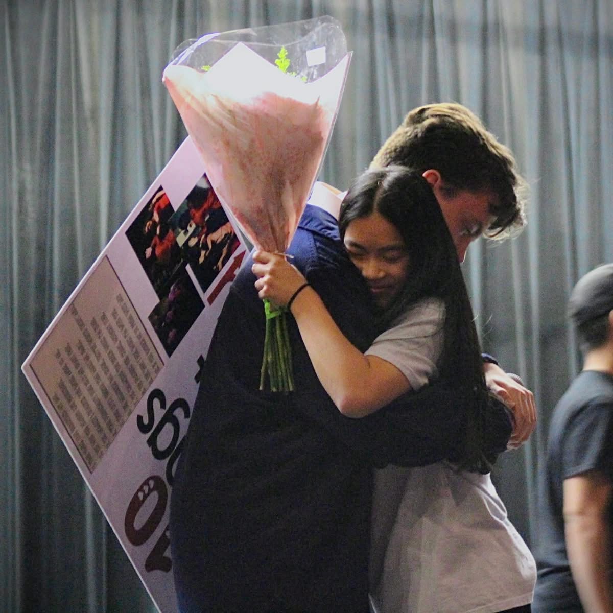 Photo of the Day #142!
Senior Tyler May asking senior Elyssa Marsden to prom by recreating the "bleacher scene" from "10 Things I Hate About You," where the main character Patrick asks a girl named Kat to prom; which both Kat and Elyssa answered with a "Yes!"