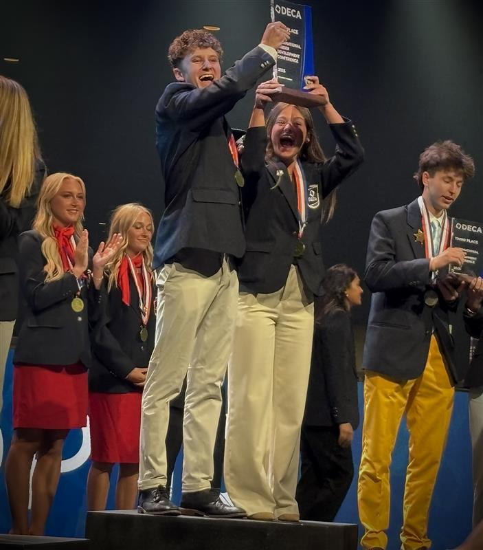 Photo of the Day #137!
Seniors Nicholas Welch and Yvette Orlowski celebrate placing first at the DECA International Career Development Conference in Orlando, Florida for School-Based Enterprise Retail.