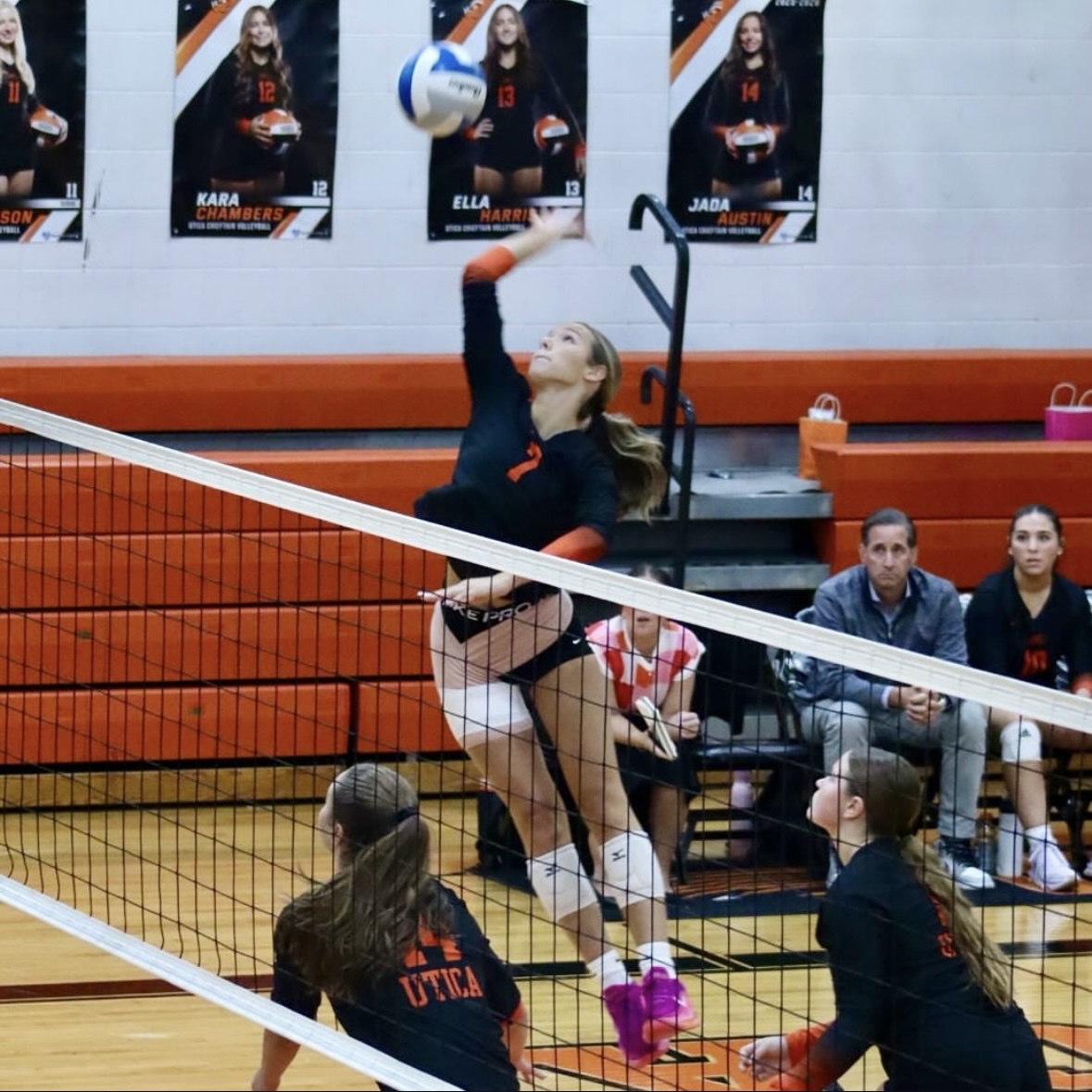 Photo of the Day #20!
Junior Ella Tringali jumps into the air before spiking the ball down on Fraser.