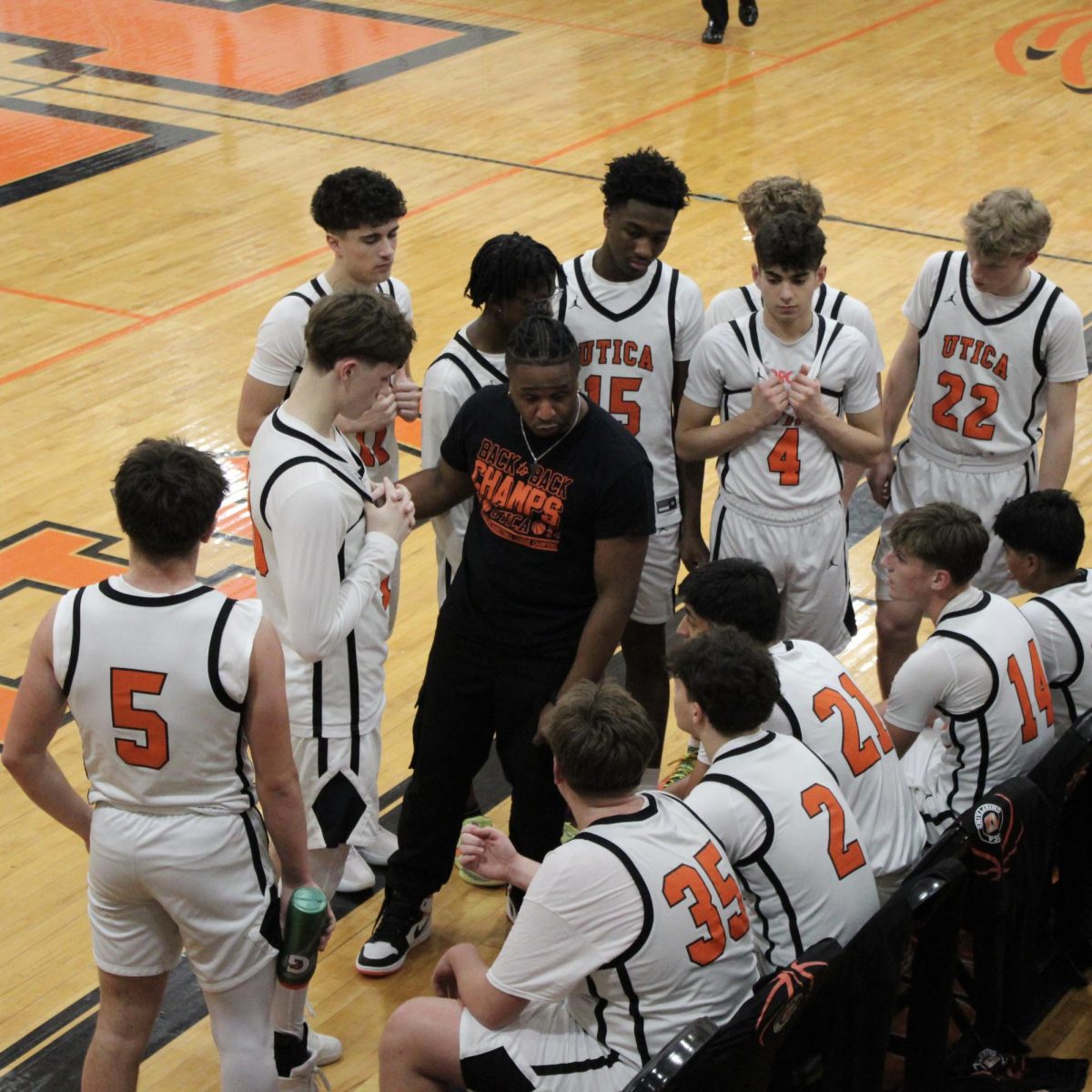 Photo of the Day #78!
The Utica JV boys basketball team huddled together discussing game strategy against Fraser High School on Jan 12.