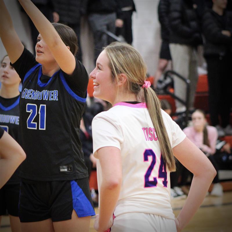 Photo of the Day #88!
The rivalry game against Eisenhower High School took on some different colors in the Utica High School gymnasium on Feb. 2. Instead of the iconic orange and white jersey, the girls basketball teams dressed in pink, like varsity player sophomore Kendall Persinger, to raise Breast Cancer awareness in honor of Andrea Tisch.