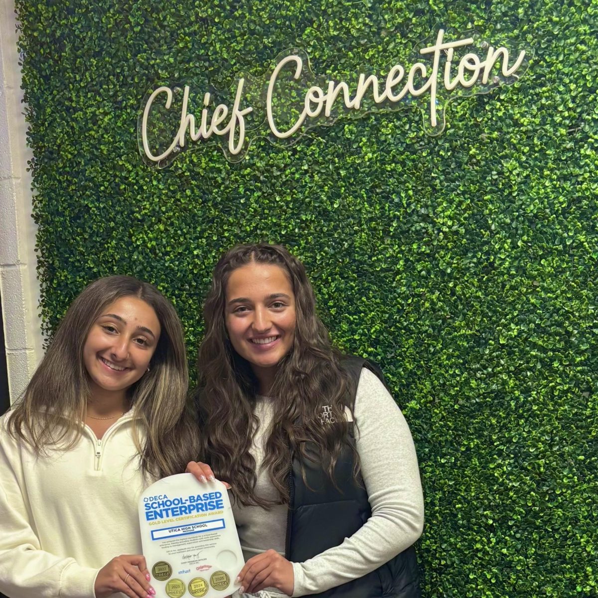 Photo of the Day #101!
25 pages later, containing information about the Chief Connection's Operations, Marketing Information Management, and Selling to maintain retail certification with DECA, written by senior Juliana Hebaka and Ava Piazza, received a DECA GOLD Certification in School Based Enterprise. The two will now attend the State Career Development Conference and compete as a "practice" run with a 10-minute presentation on Selling including their best practices. All of this hard work has allowed them to qualify and attend the International Career Development Conference in Atlanta, Georgia and compete against 400 other school stores around the United States.