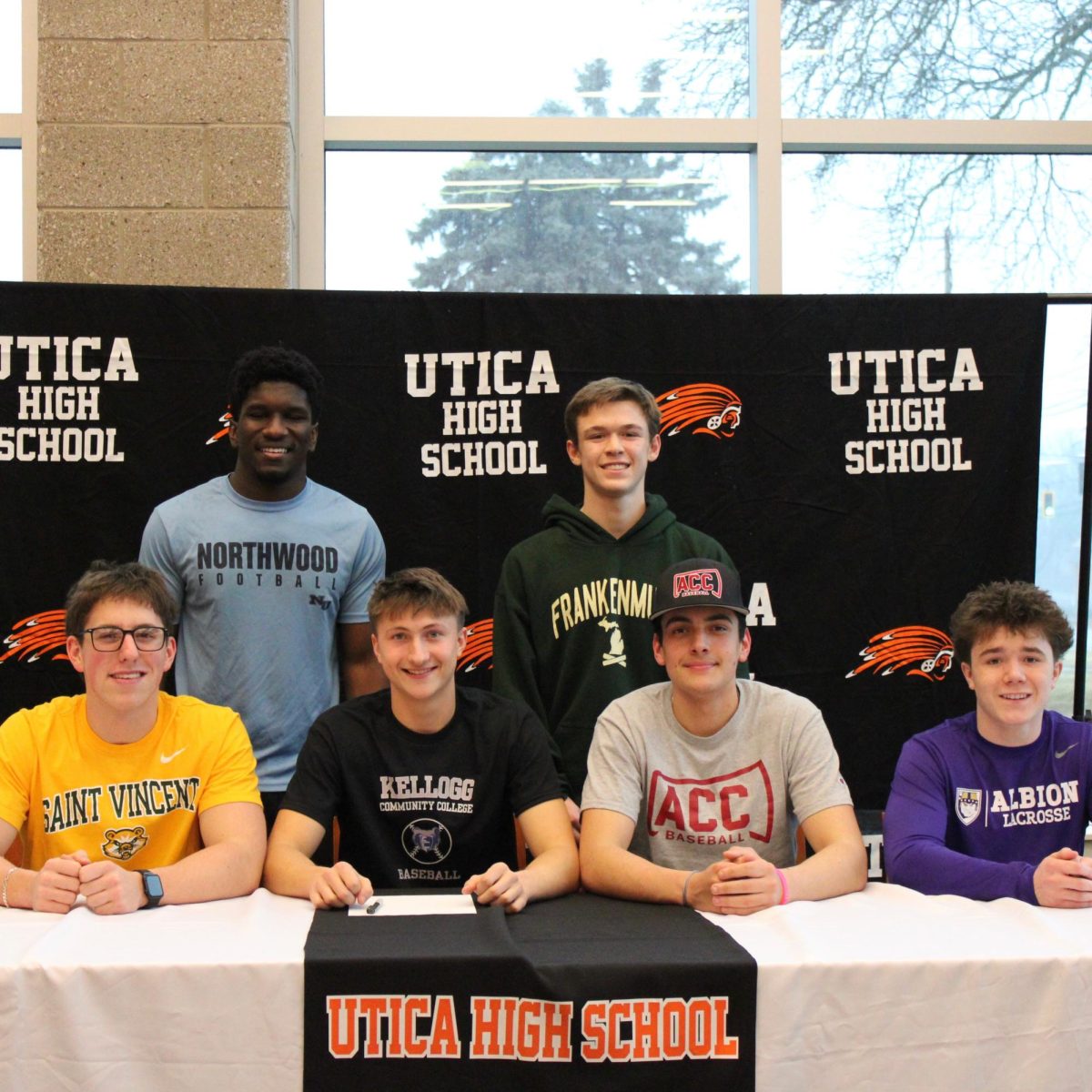 Photo of the Day #105!
Taking the next big step in their athletic careers, seniors Mahti Gwilly, Adam Shimmell, Dominic Ligocki, Jimmy Lasceski, Christopher Ventimiglia, and Tate Tomatti sign commitments to their respective collegiate teams during Utica High School's signing day event on Mar 5.
