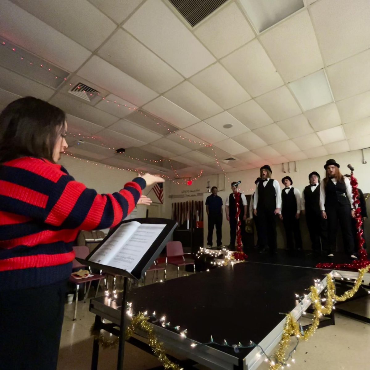 Photo of the Day #119!
Raising money by raising their voices in song, the Utica High School choir put on a performance paired with coffee in their event the "Choir Coffee House Cabaret" so gather funds for their program on Mar. 25.