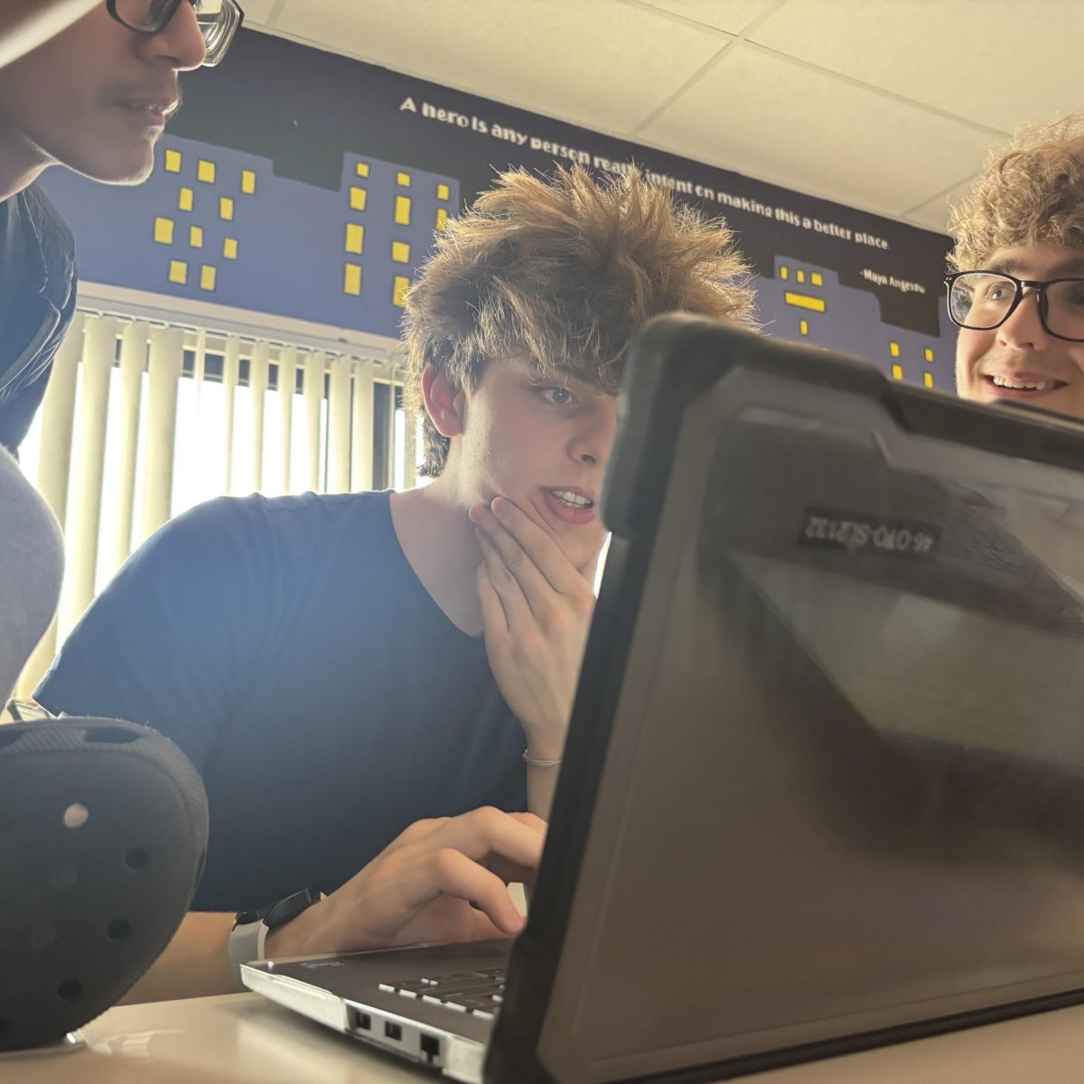 Photo of the Day #120!
In the club's very first crisis committee meeting held in Collin Syler's room, Model UN members worked together to create proposals that would solve a fictional orbital disaster. Two satellites, one from the United States and the other from China, collided, causing system shut downs and copious amounts of space pollution. After discussion, two solutions were brought to the floor. The first submission, sent in by delegates of India, called for satellite standard adjustments and open communication of what each country puts into orbit. The second was sent in by delegates of Israel, who wanted to fund research of the problem and hold responsible parties accountable. After a monetary deal was made between China and the United States, Israel's proposal was chosen through popular vote on Mar. 25.