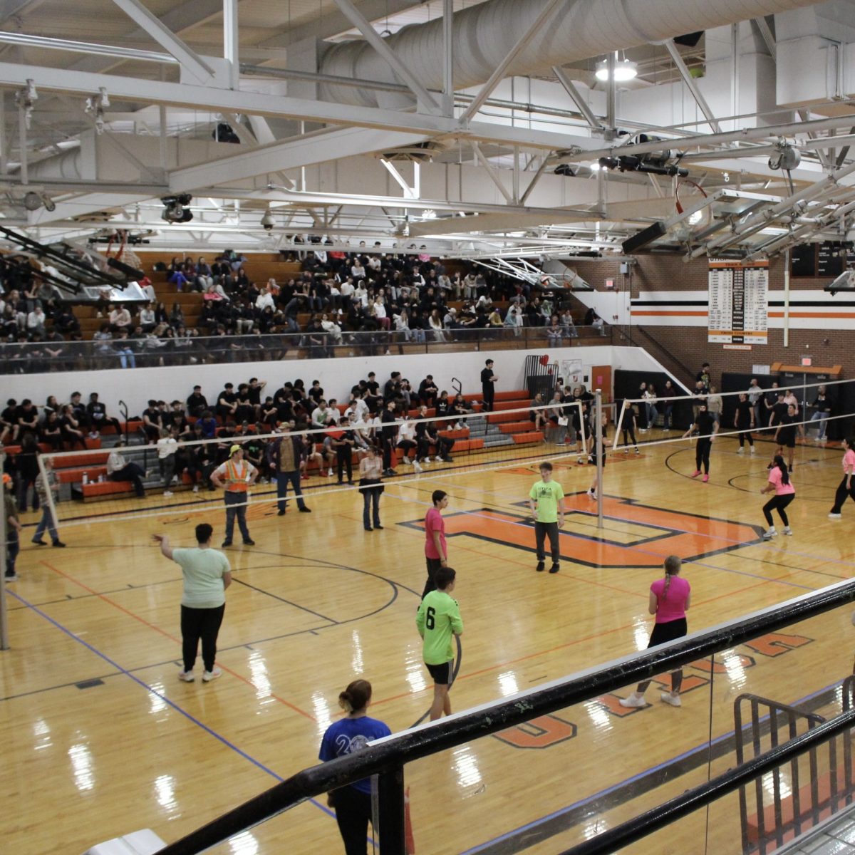 Photo of the Day #121!
Although enjoying the volleyball competition before them as a mini break before Spring Break to raise funds for the Utica Student Council, many students were seen entertained and participating in the small intermissions of games; especially to reap the reward of a sucker on
Mar. 27.